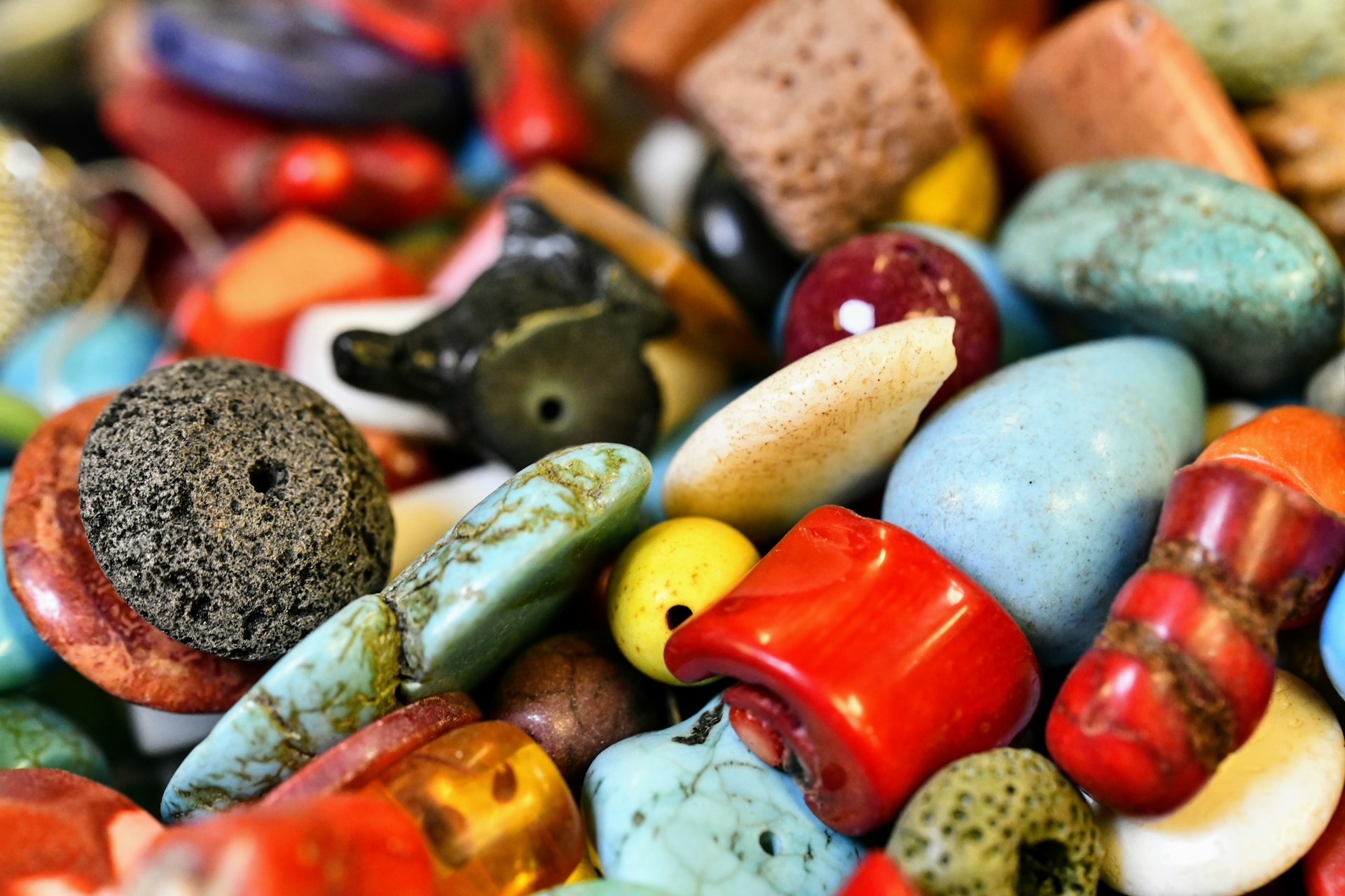 assorted color of stones on white surface