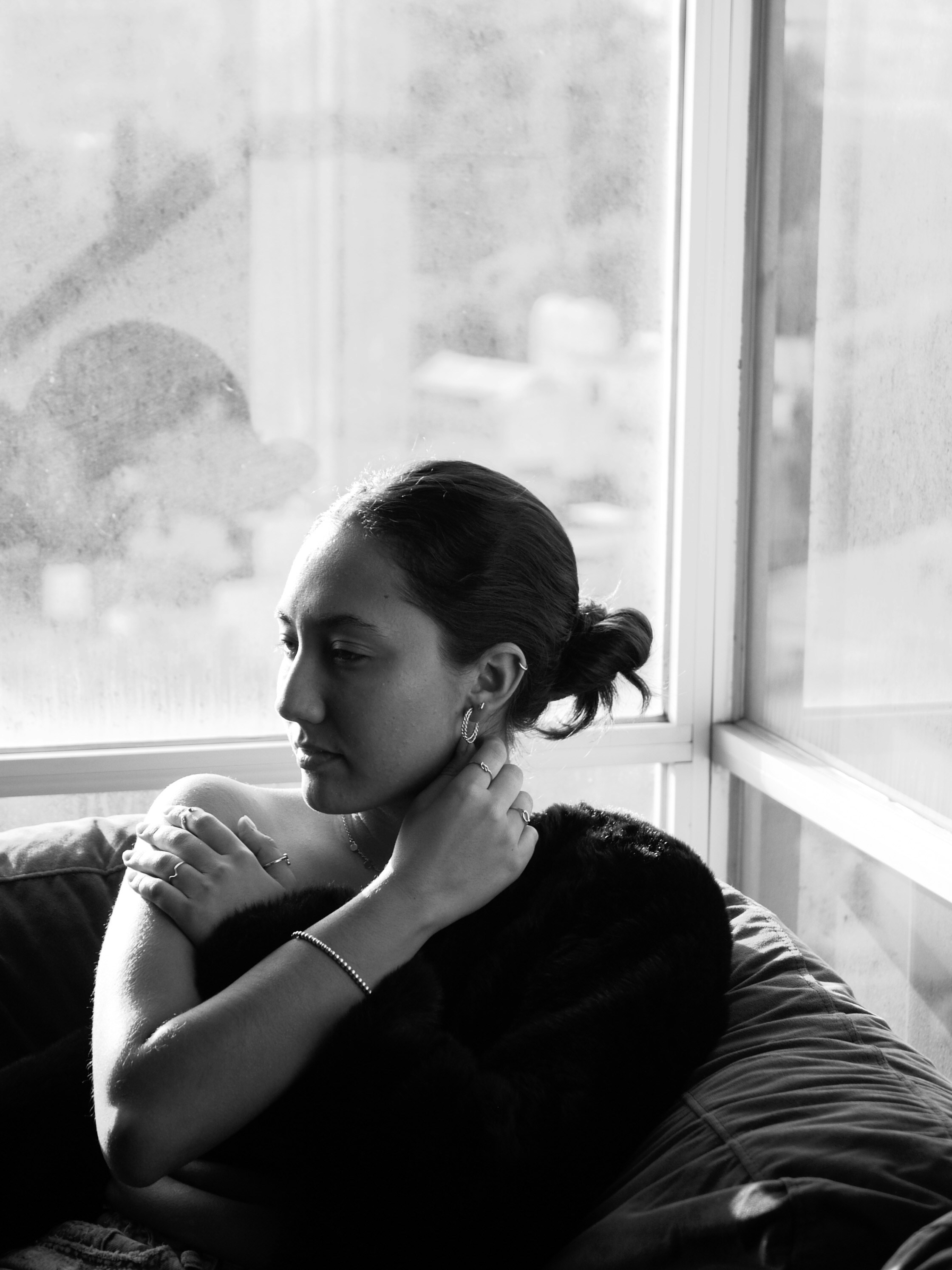 woman wearing yellow long-sleeved dress under white clouds and blue sky during daytime