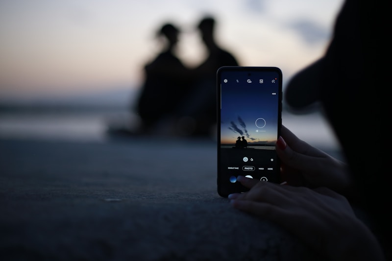 Holding phone