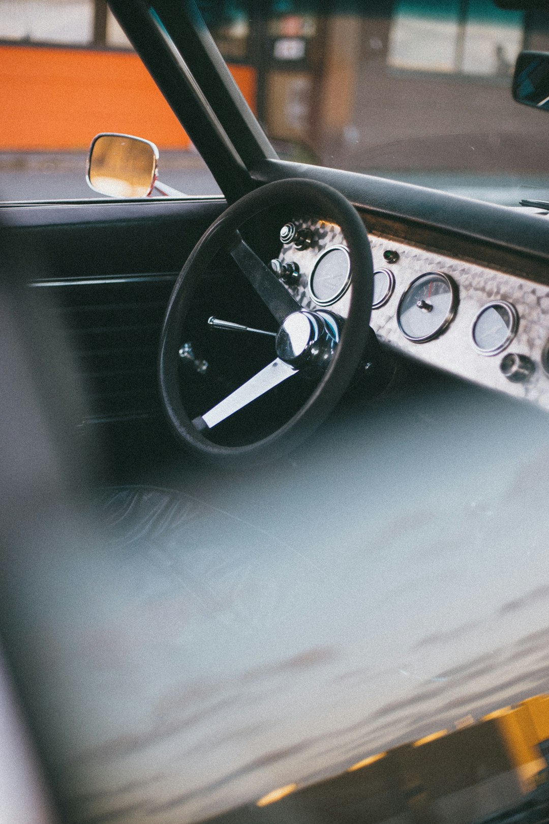 black and silver car steering wheel