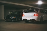 white and black car on parking lot