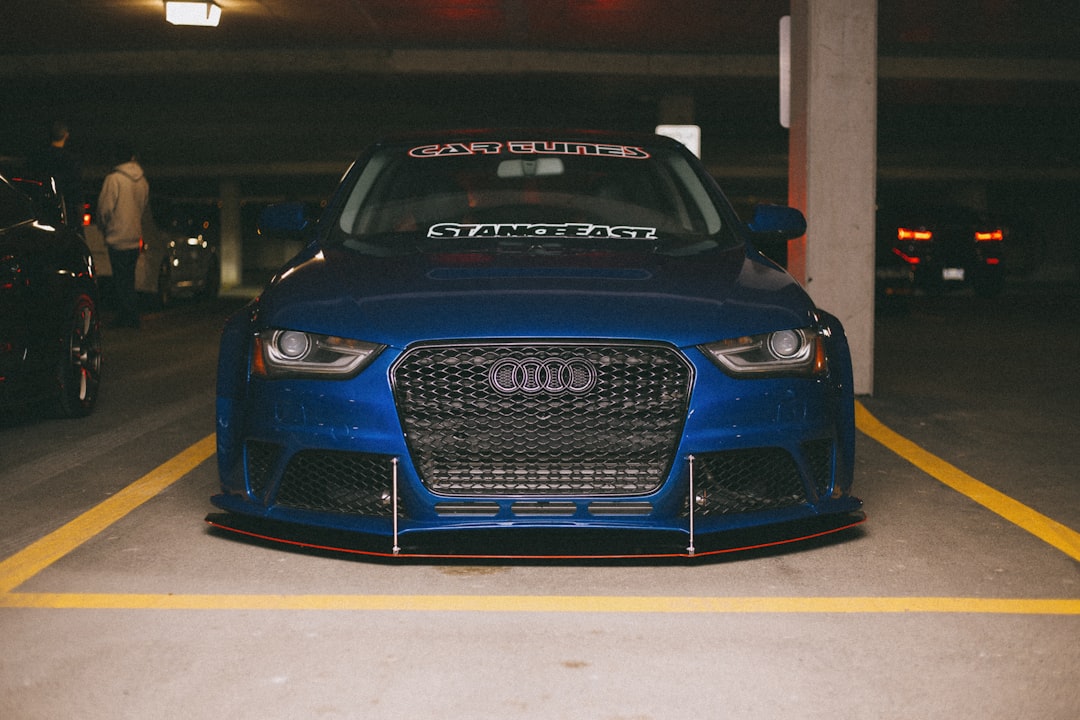 black audi a 4 parked in garage