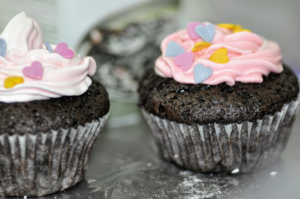 chocolate cupcake with white icing on top