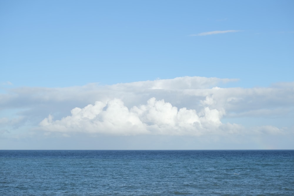 white clouds over blue sea during daytime