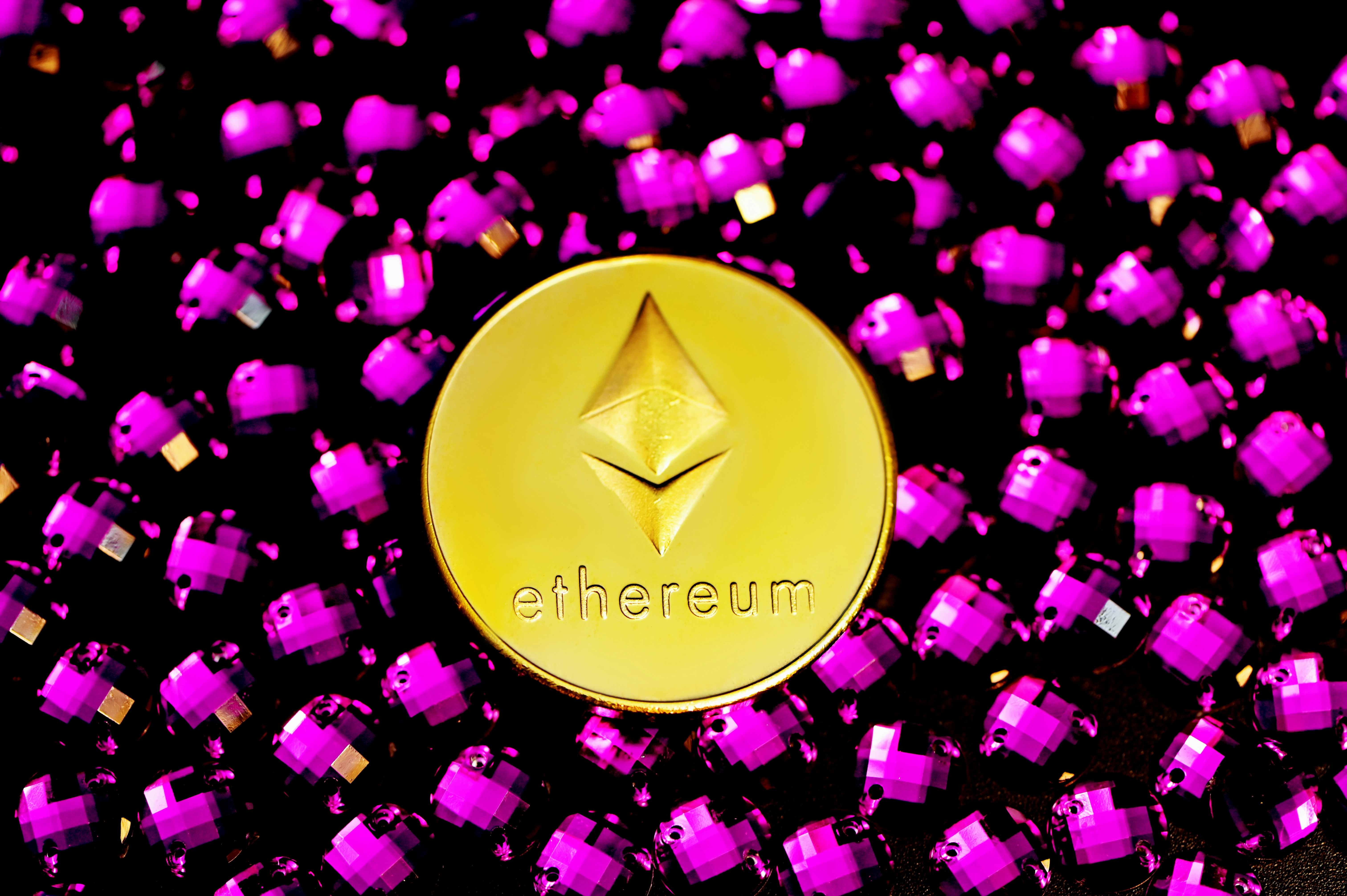 Ethereum coin on top of purple crystals
