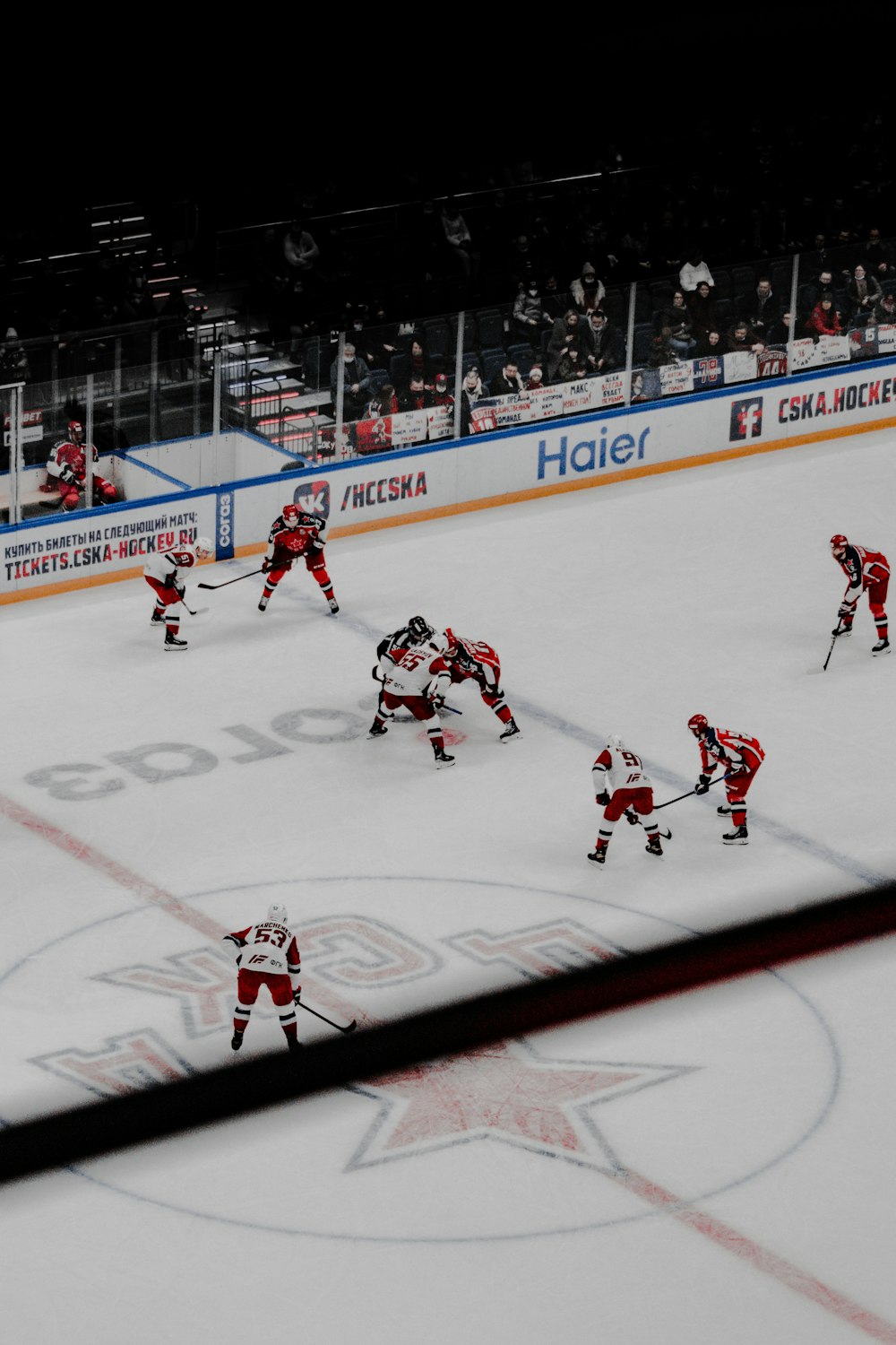 ice hockey players on ice hockey field