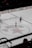 An ice hockey match is underway in an arena with players in jerseys and an official in black and white stripes visible. The center of the rink features a large star emblem with Russian text around it. Advertisements in Cyrillic script are displayed on the boards surrounding the rink.