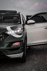 white car with open door