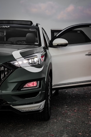 white car with open door