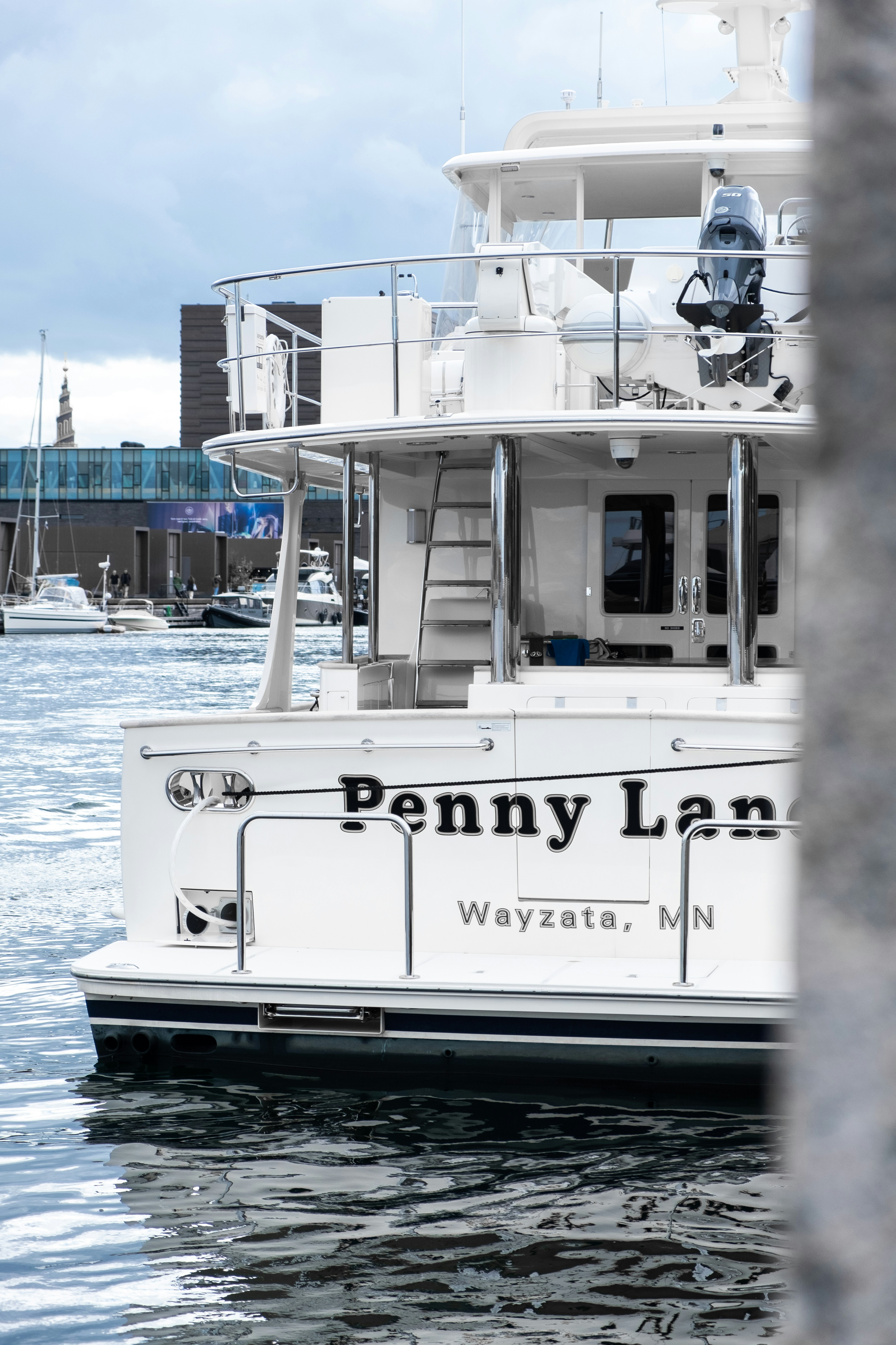 Reflective boat registration number decals on hull