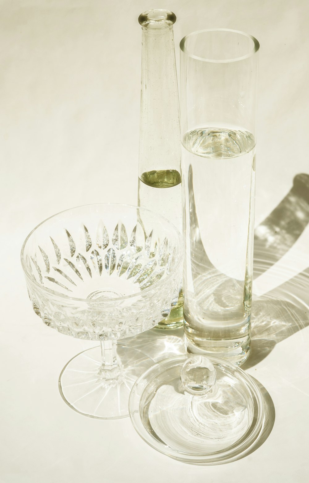 clear glass bowl and drinking glass
