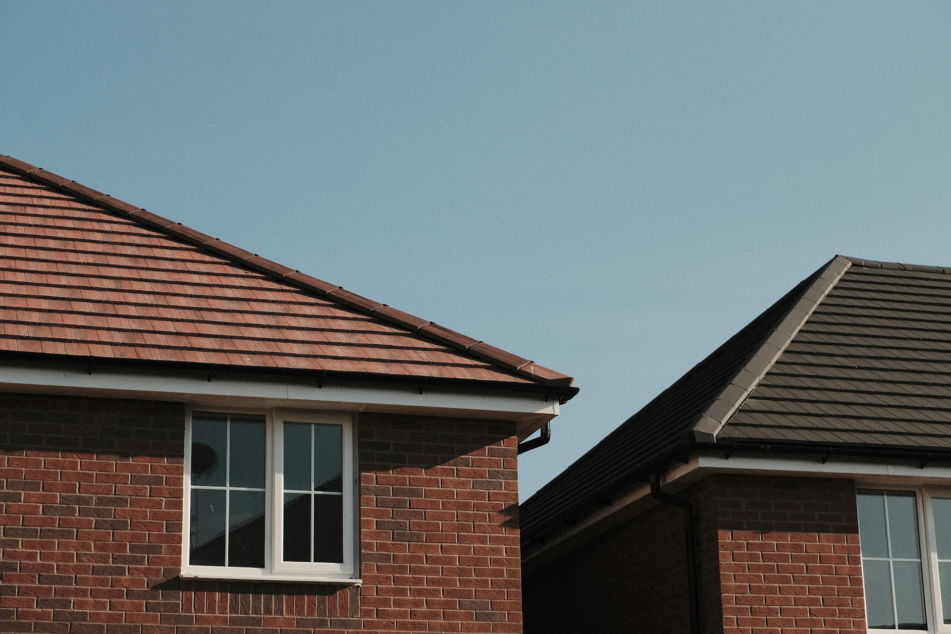 Attractive UK brick house with a well-maintained pitched roof