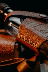 brown leather strap on brown leather textile