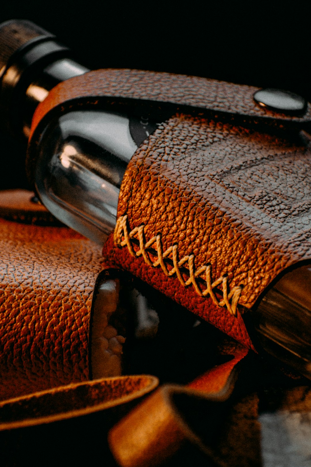 brown leather strap on brown leather textile