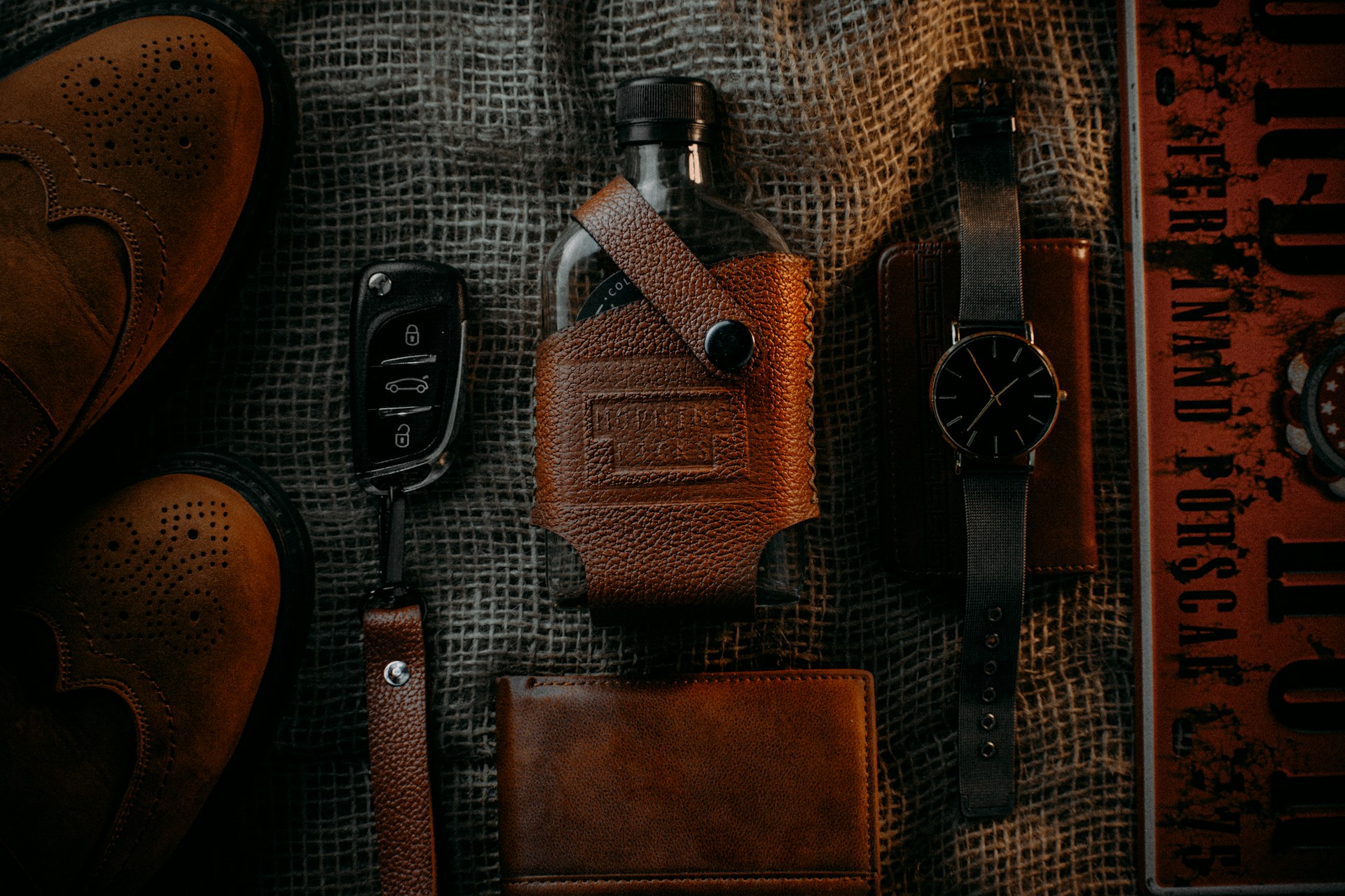 black and brown leather sling bag
