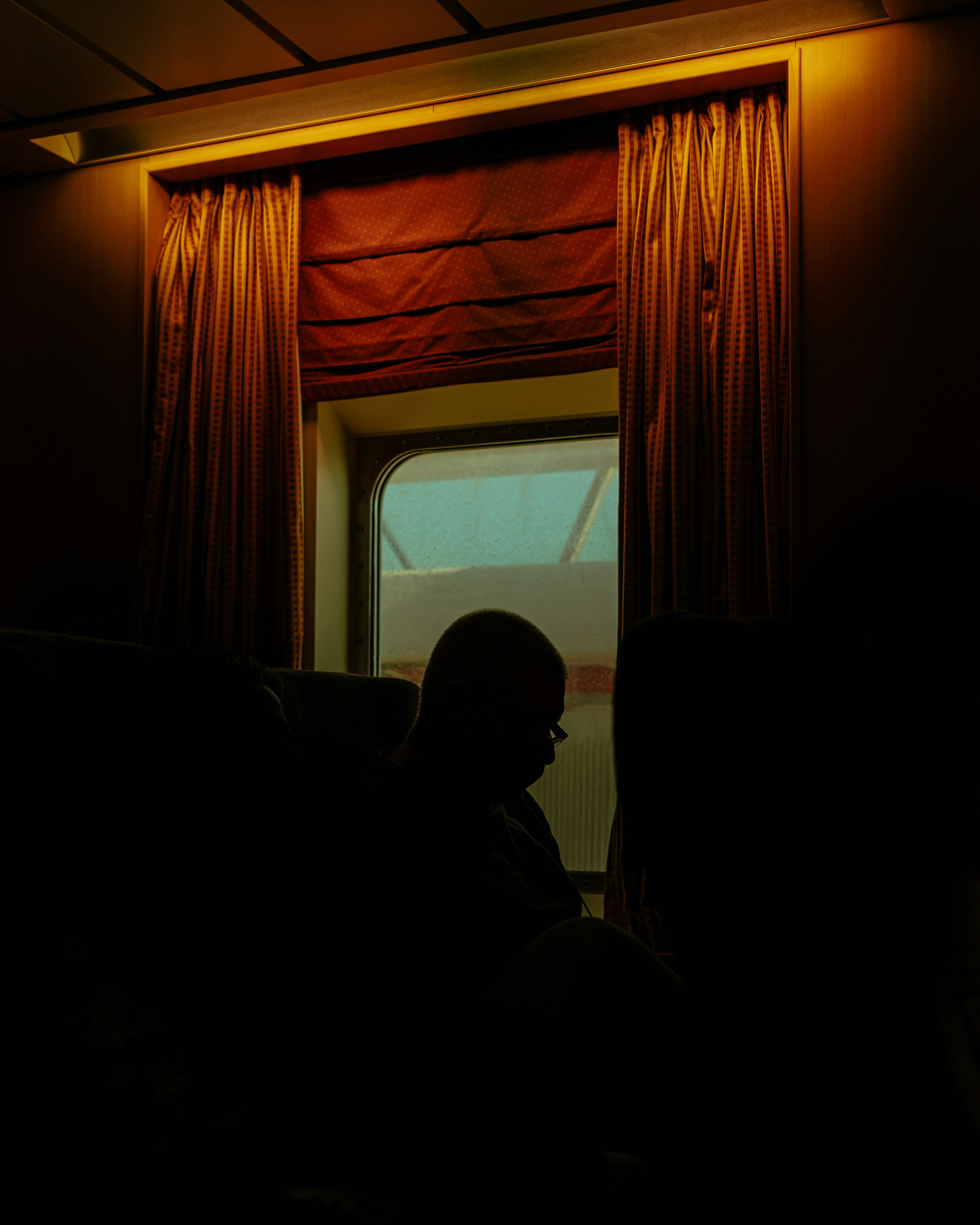 A senior person doing gentle stretches in a living room