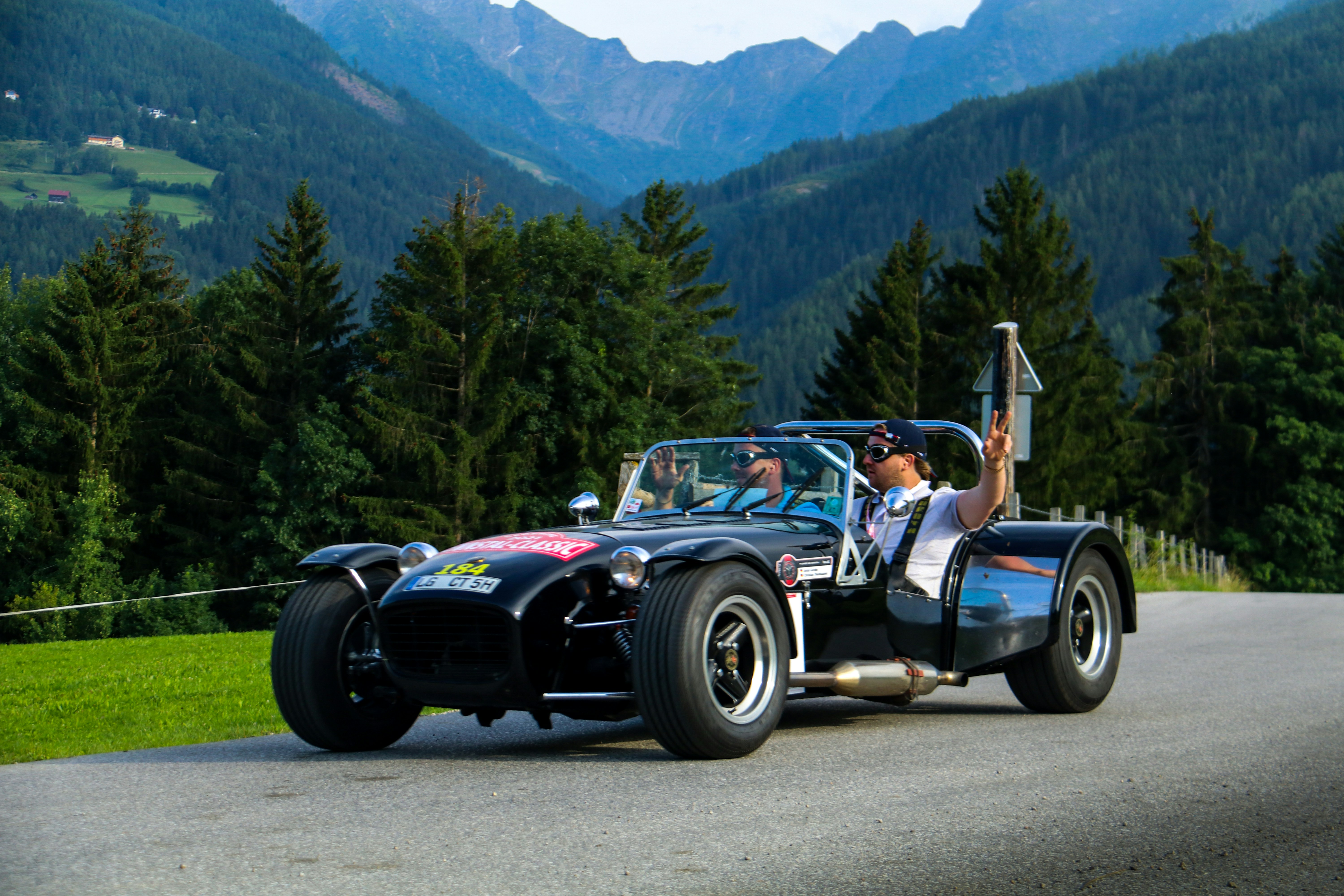 black convertible car on road during daytime