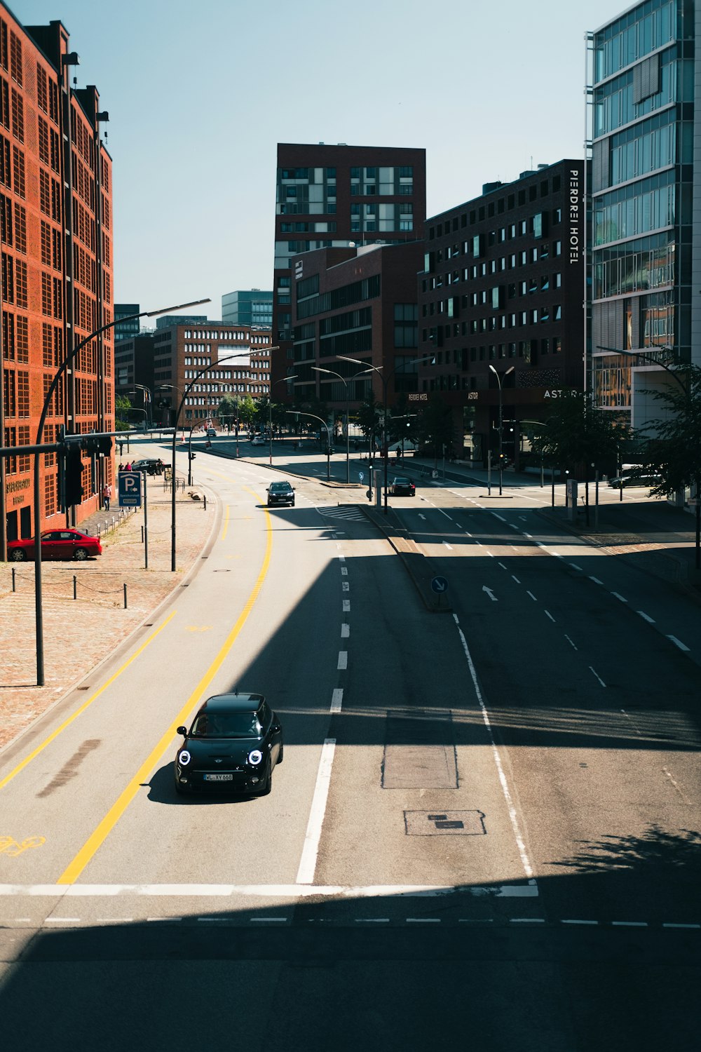 black car on road during daytime