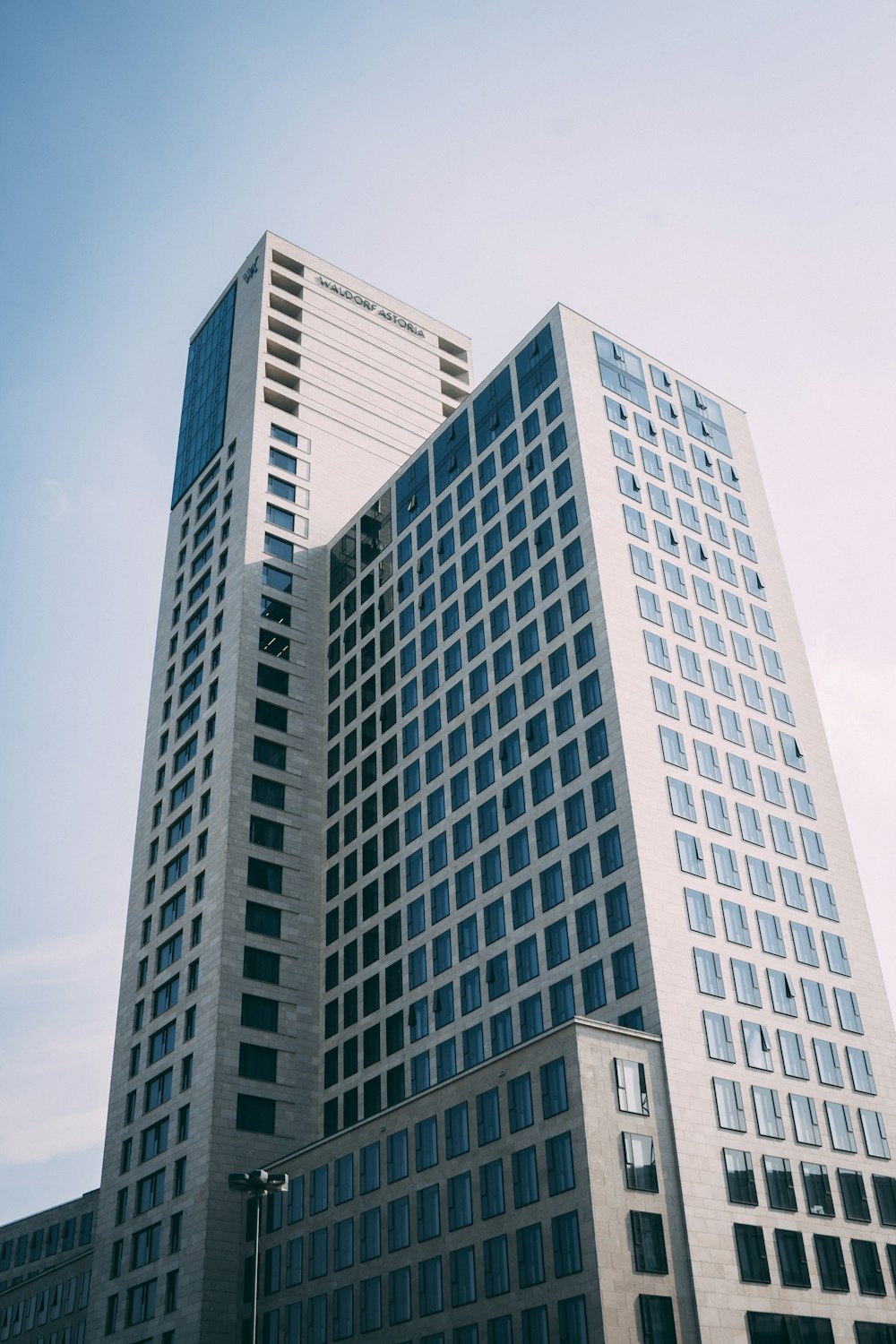 white concrete building under blue sky during daytime