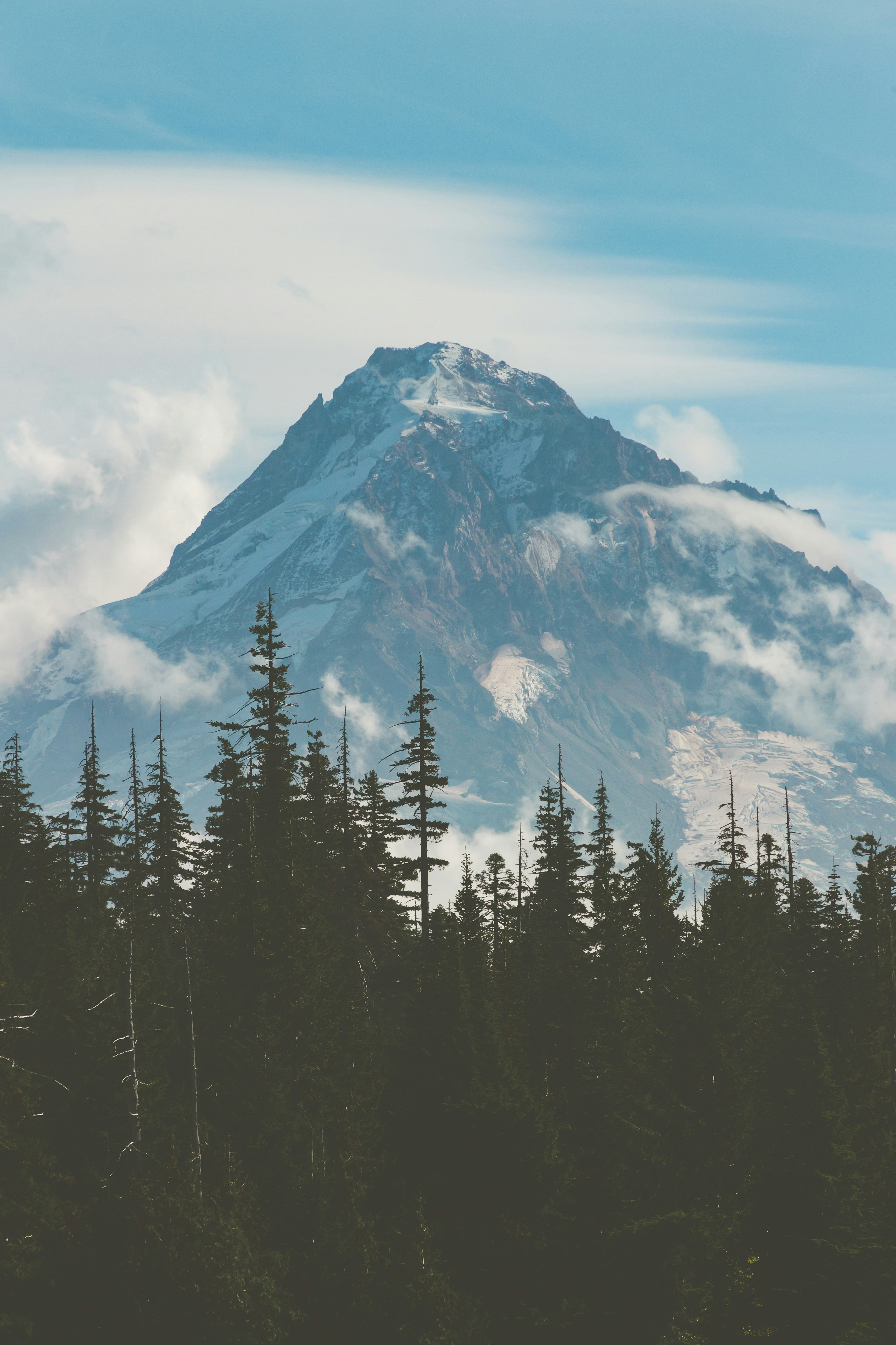 snow covered mountain under blue sky during daytime