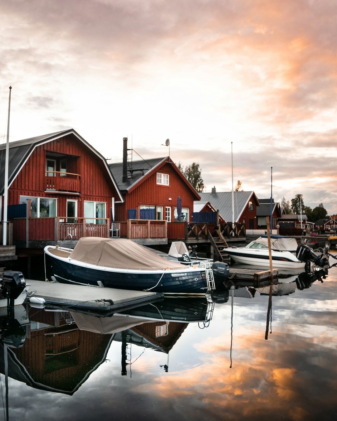 white and red boat on dock during daytime