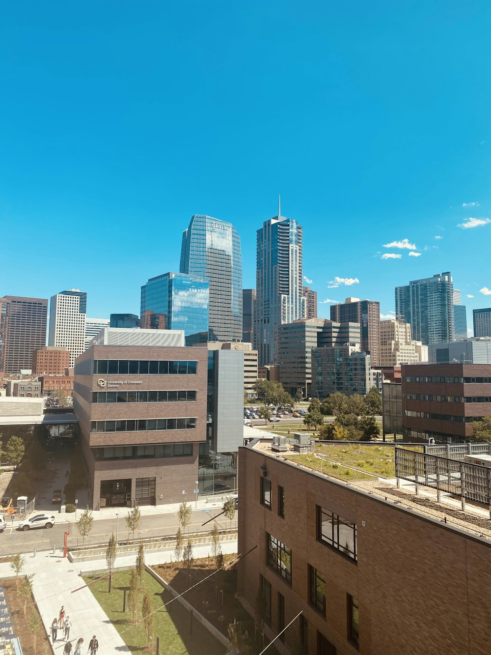 brown and white concrete buildings under blue sky during daytime