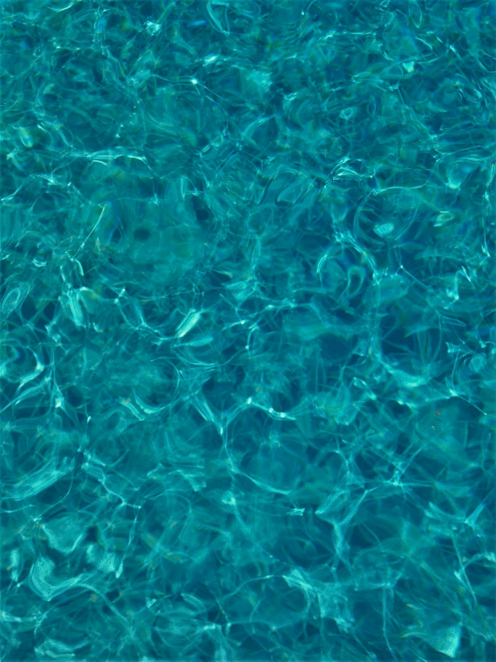 blue water with white bubbles