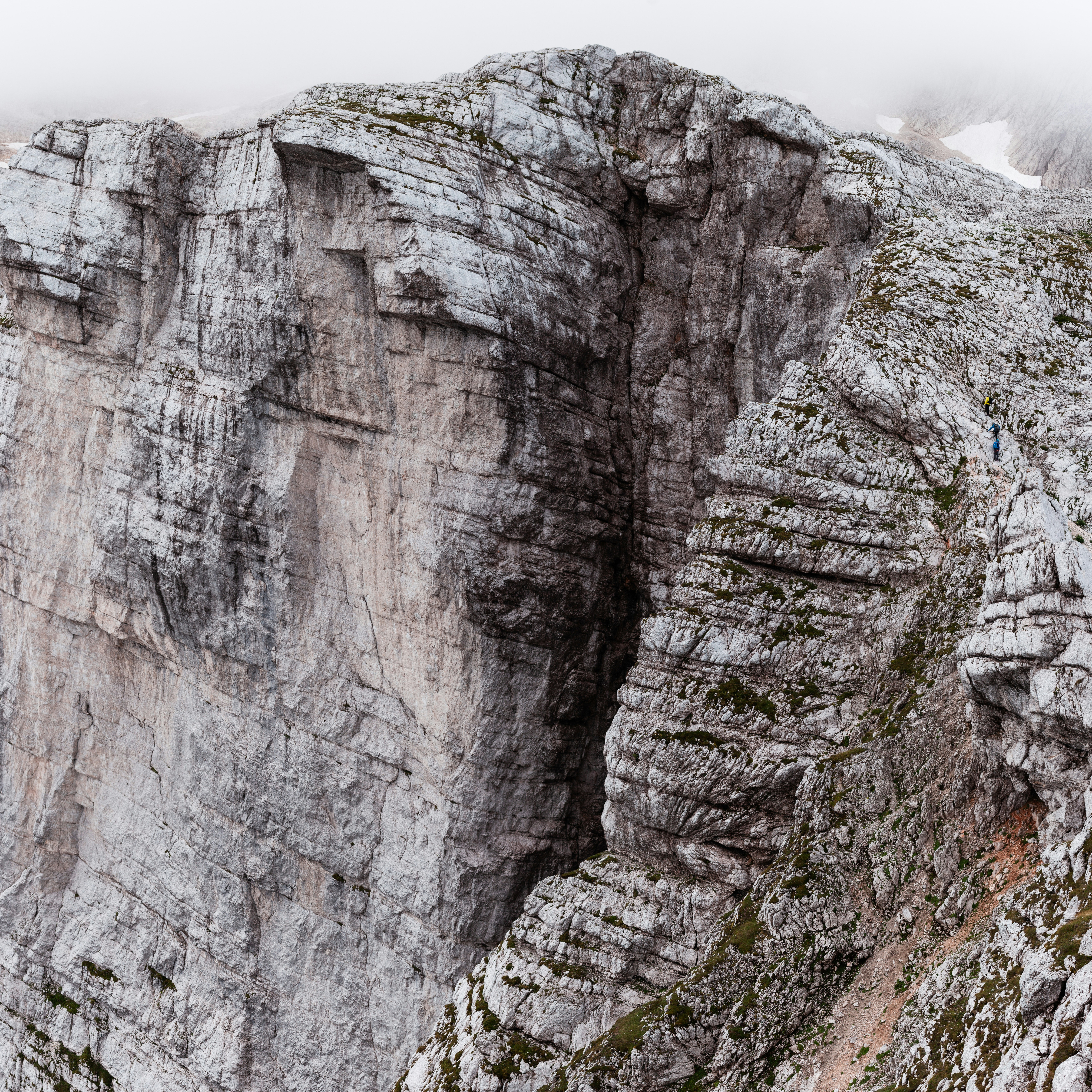 gray rocky mountain under white sky during daytime