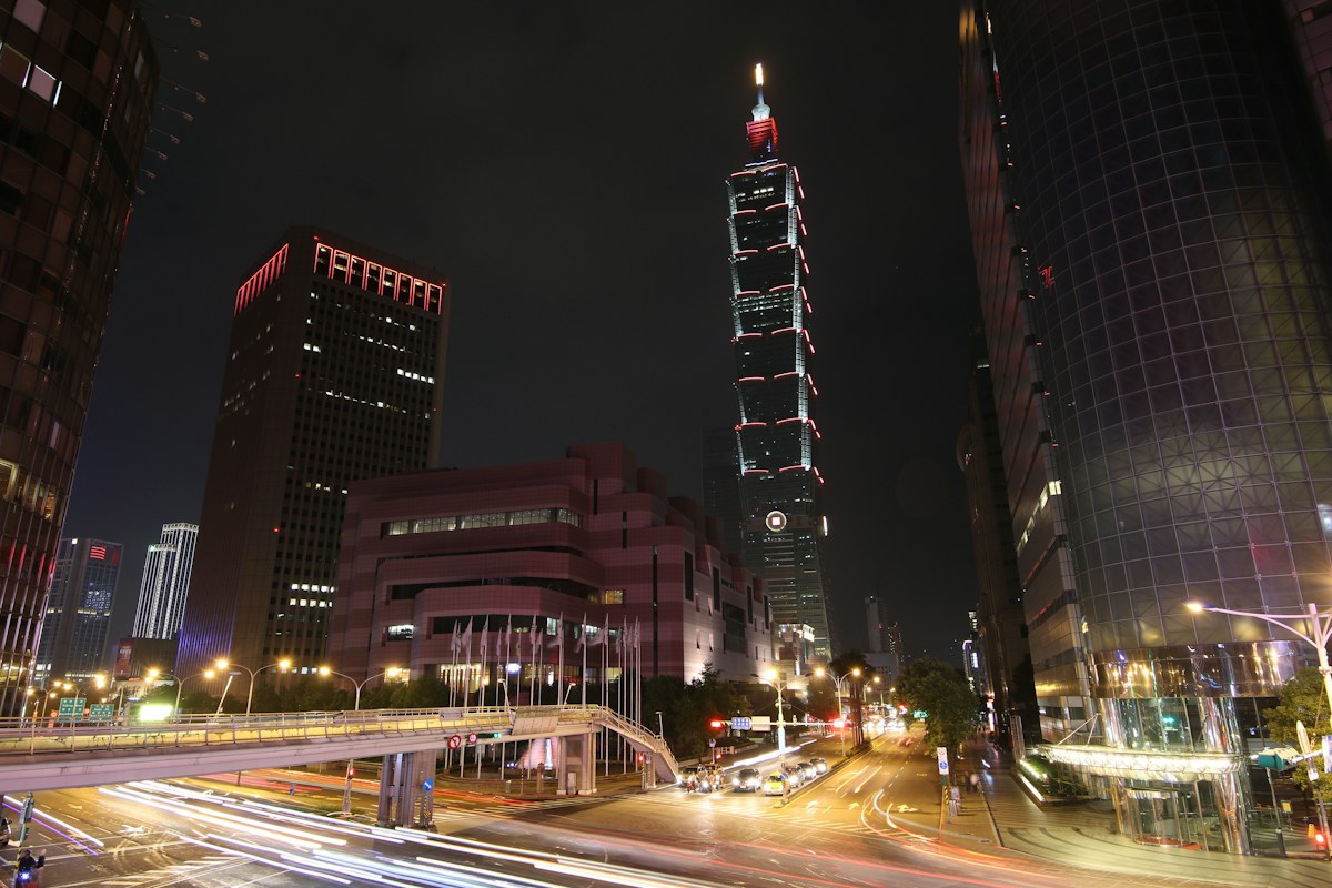 Night street and traffic light trails around Taipei 101