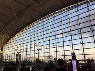 A welcoming airport scene with travelers being greeted by friendly staff.