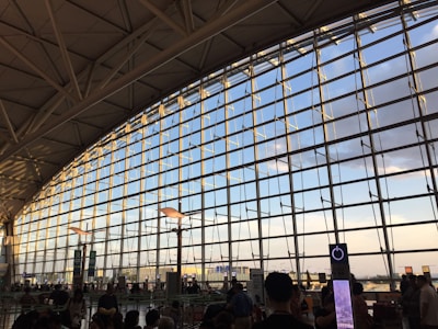 A welcoming airport scene with travelers being greeted by friendly staff.