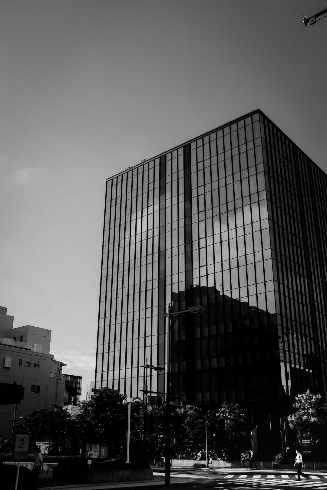 grayscale photo of high rise building