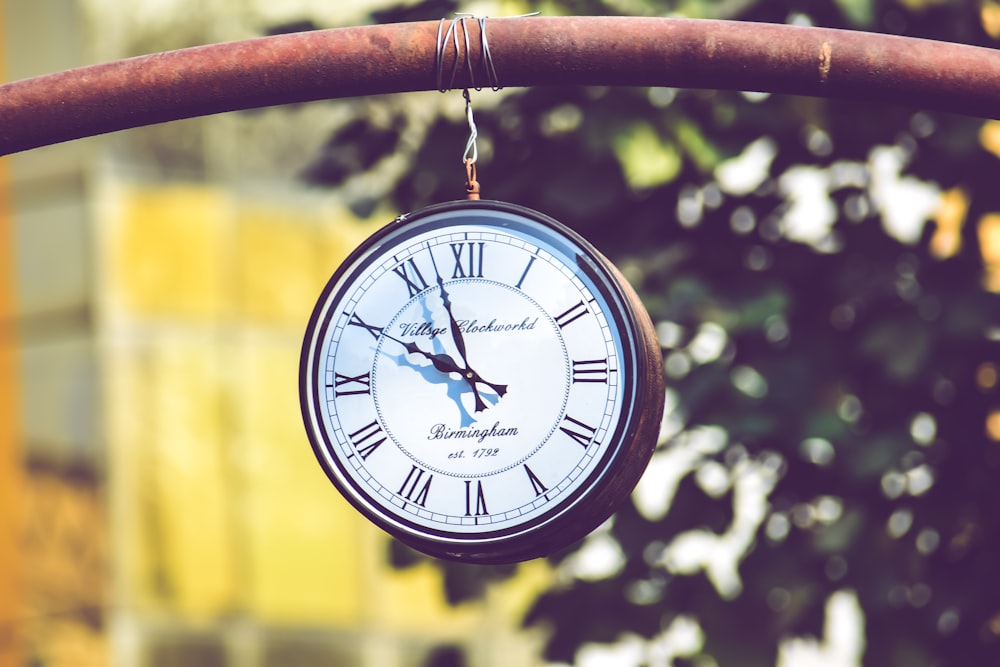 black and white analog clock