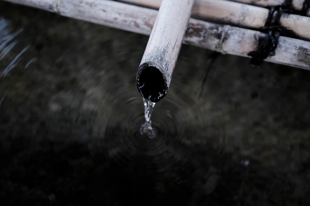 water drop on white pipe