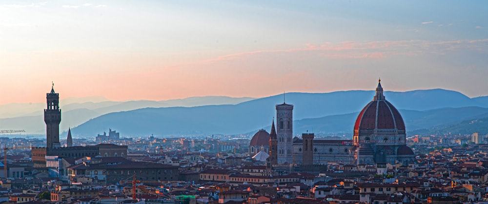 city skyline during orange sunset