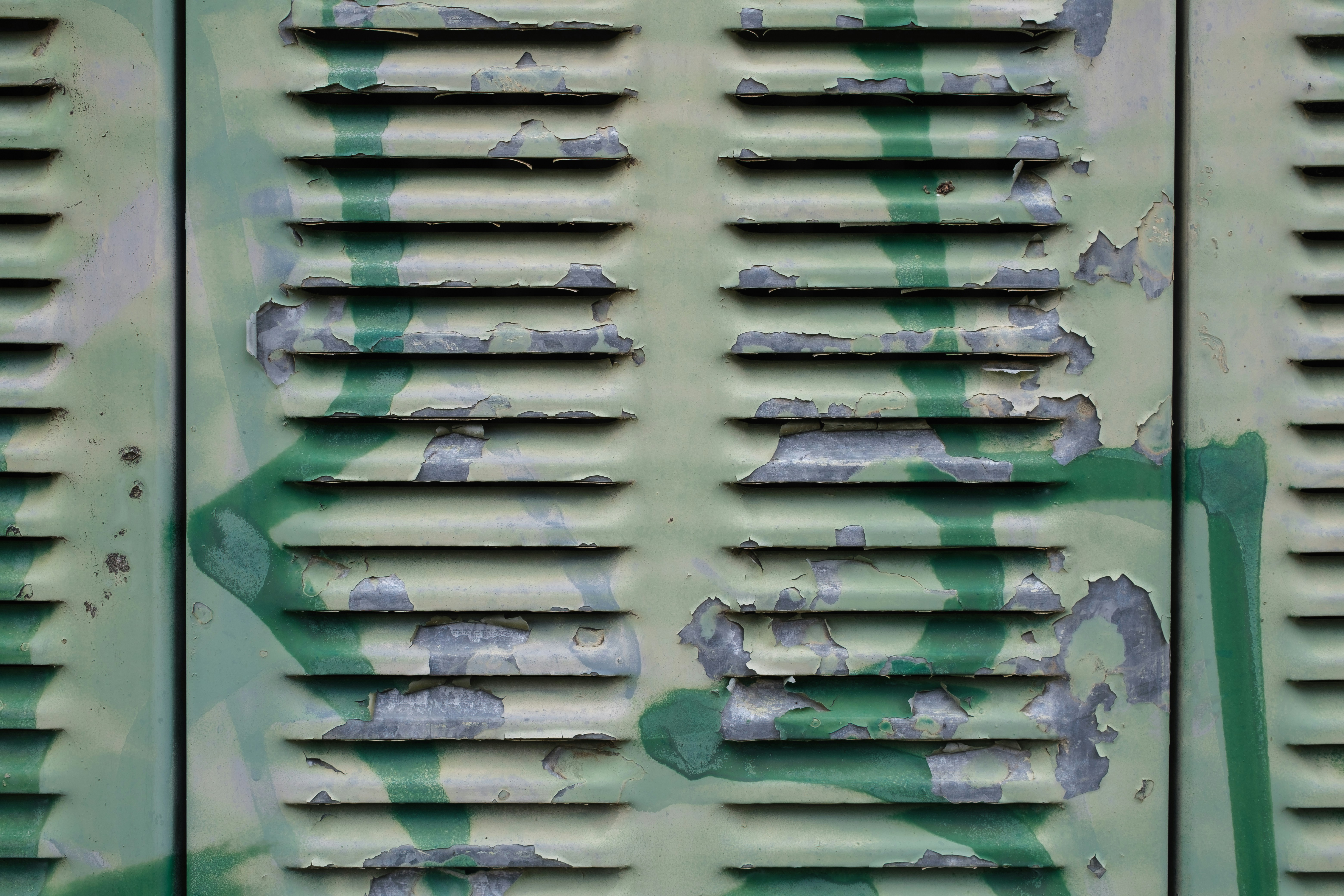 green and brown concrete wall