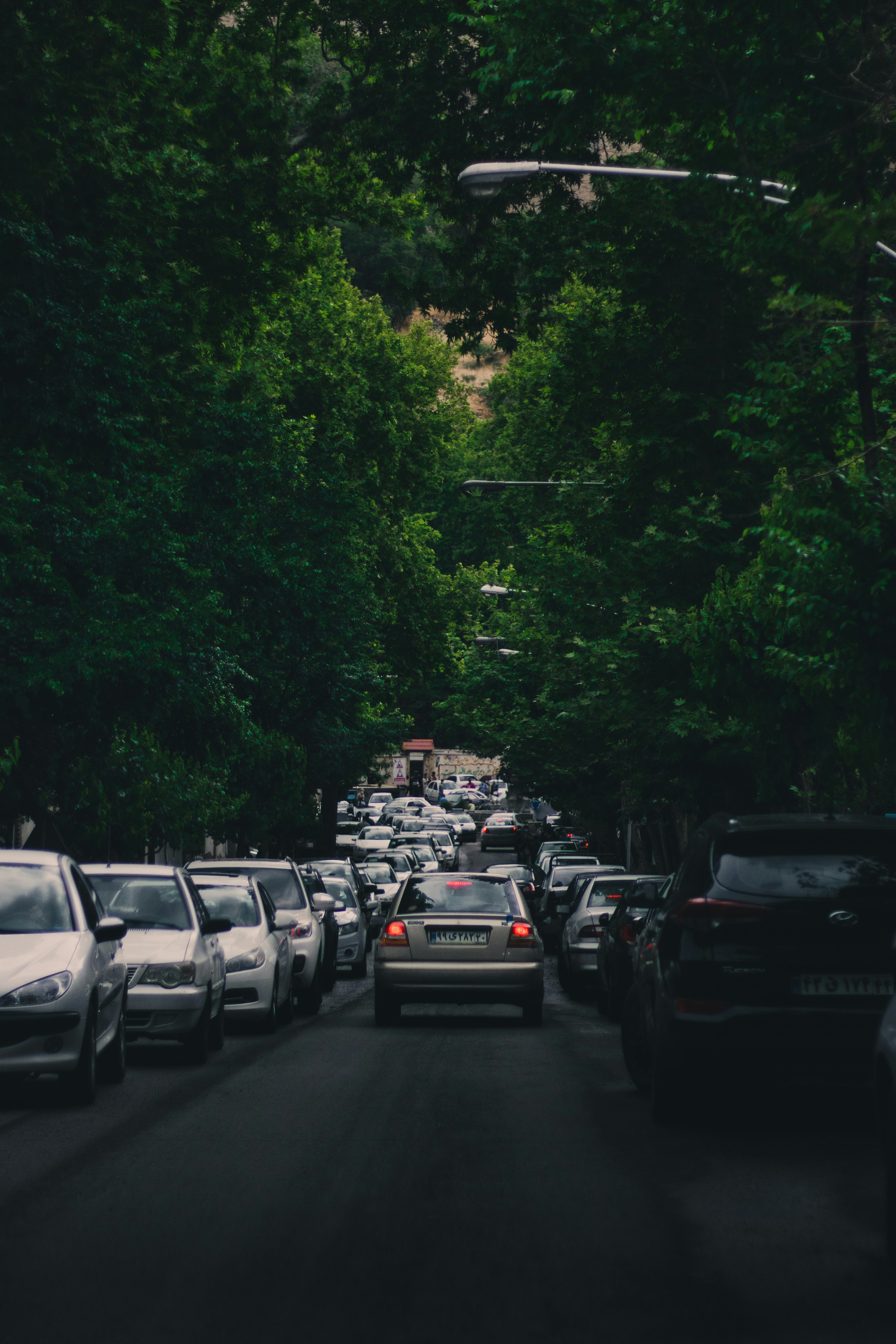 cars parked on parking lot during daytime