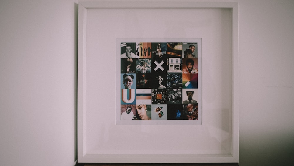 white wooden framed photo of people