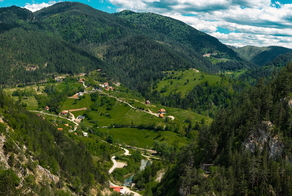 green mountains under white clouds during daytime