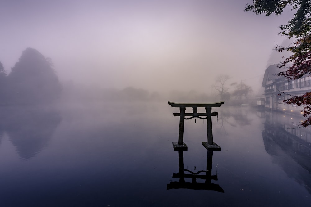 black cross on foggy weather