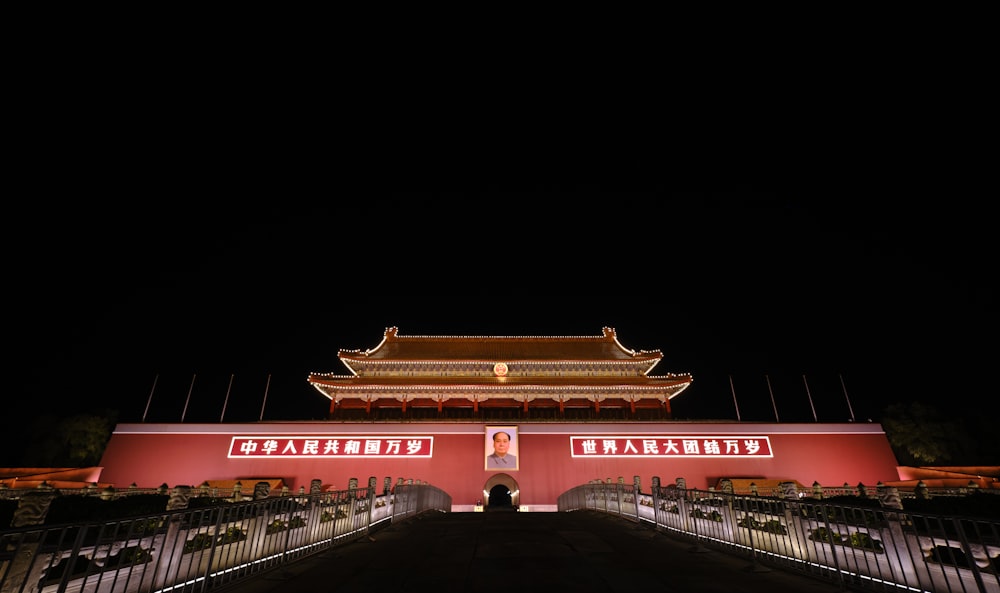 red and white temple during night time