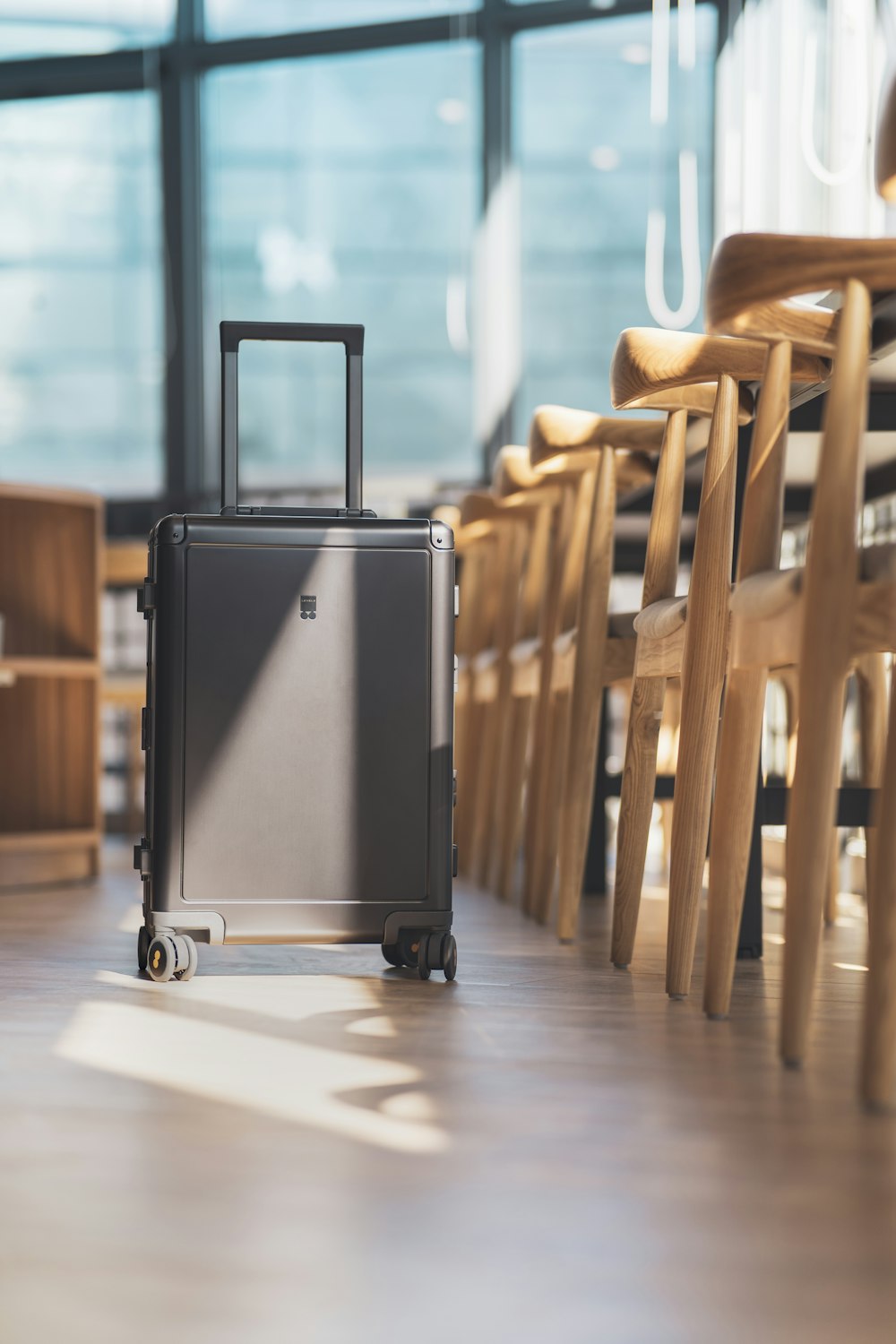 a suit case sitting on top of a hard wood floor