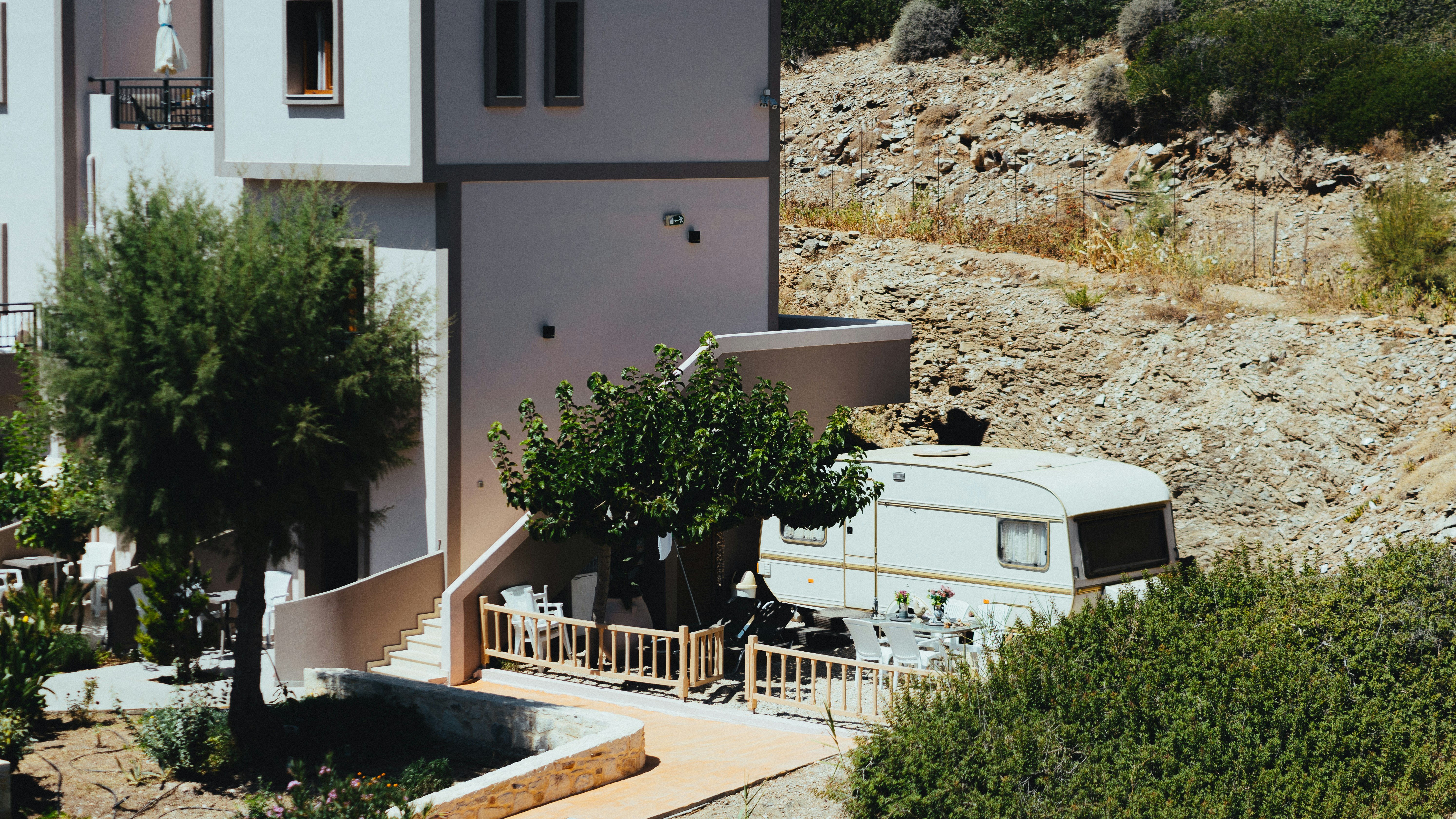 green plants in front of white concrete building