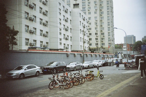 Environmental sensors installed on urban infrastructure monitoring air quality and weather.