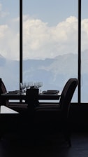A beautifully set dining area with a view of the valley.