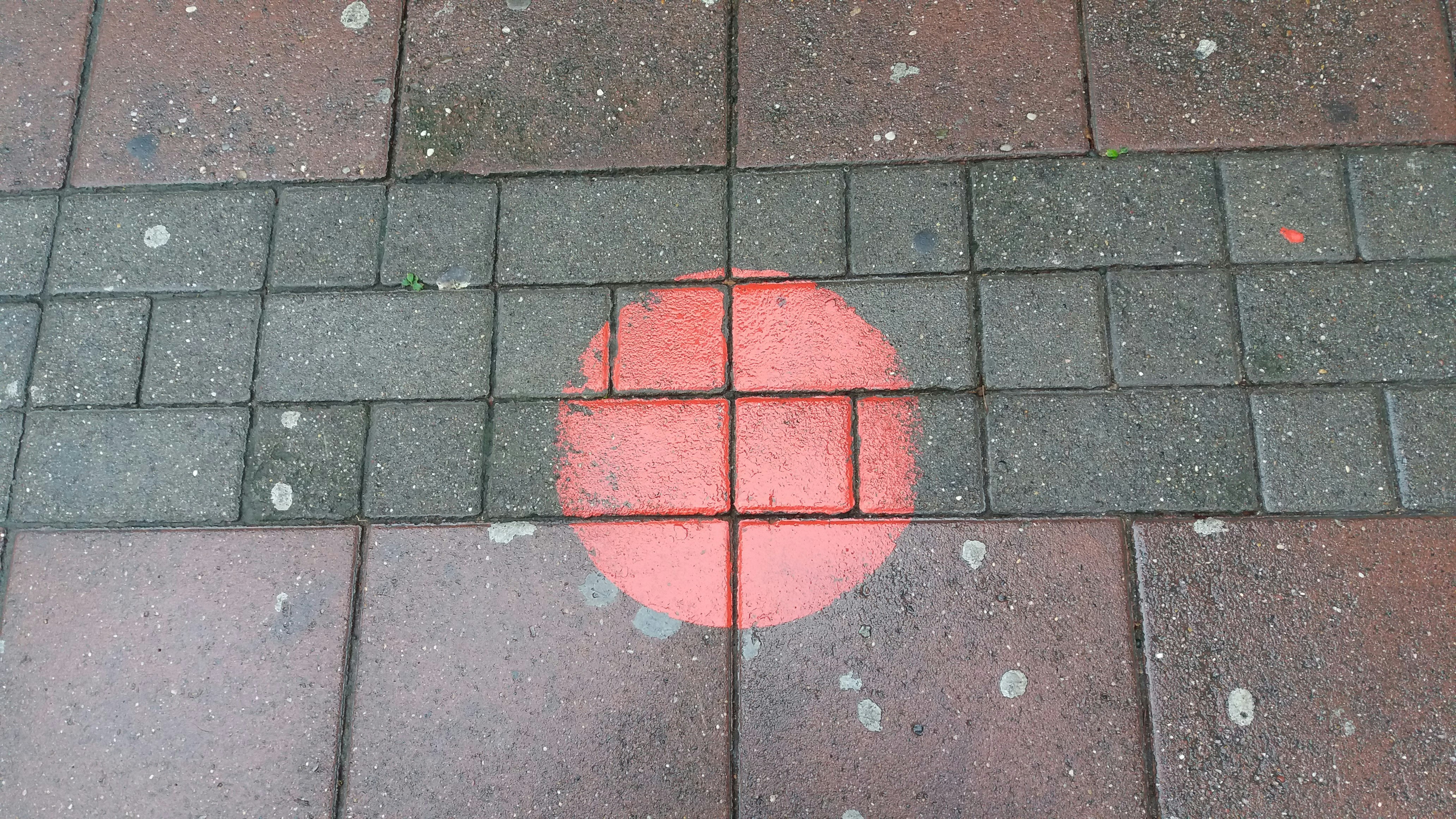 Red ball on gray floor