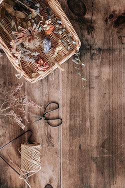 brown woven basket on brown wooden table