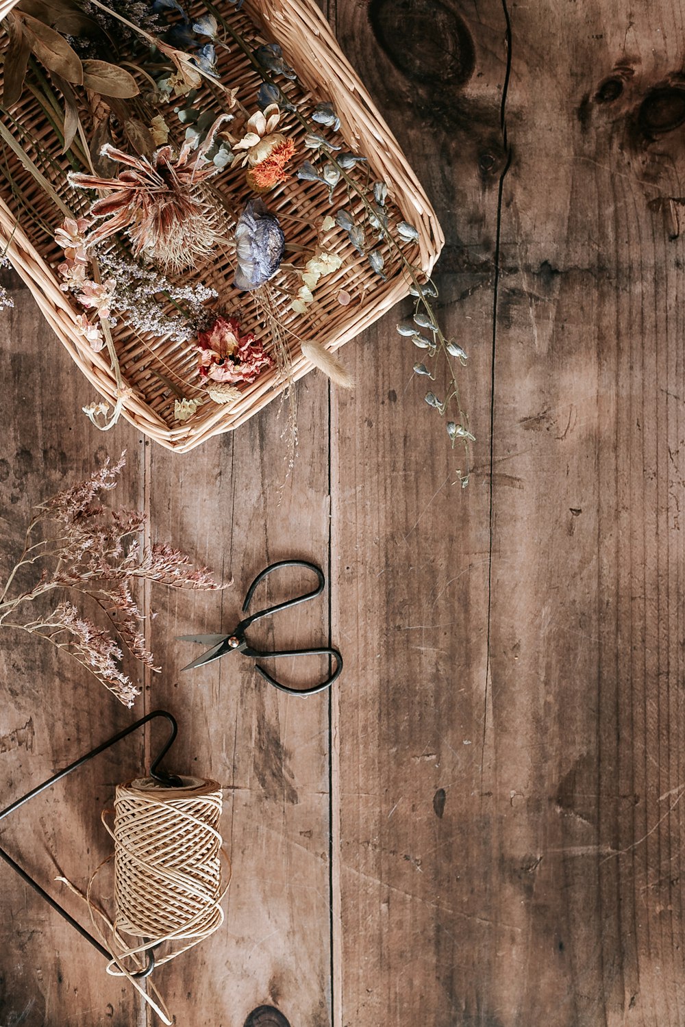 brown woven basket on brown wooden table