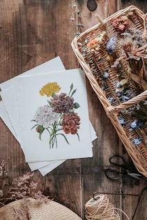 Close-up of a handcrafted flower bin holder made from reclaimed wood, filled with vibrant seasonal blooms.