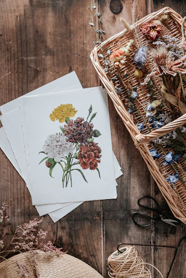 Close-up of a handcrafted flower bin holder made from reclaimed wood, filled with vibrant seasonal blooms.